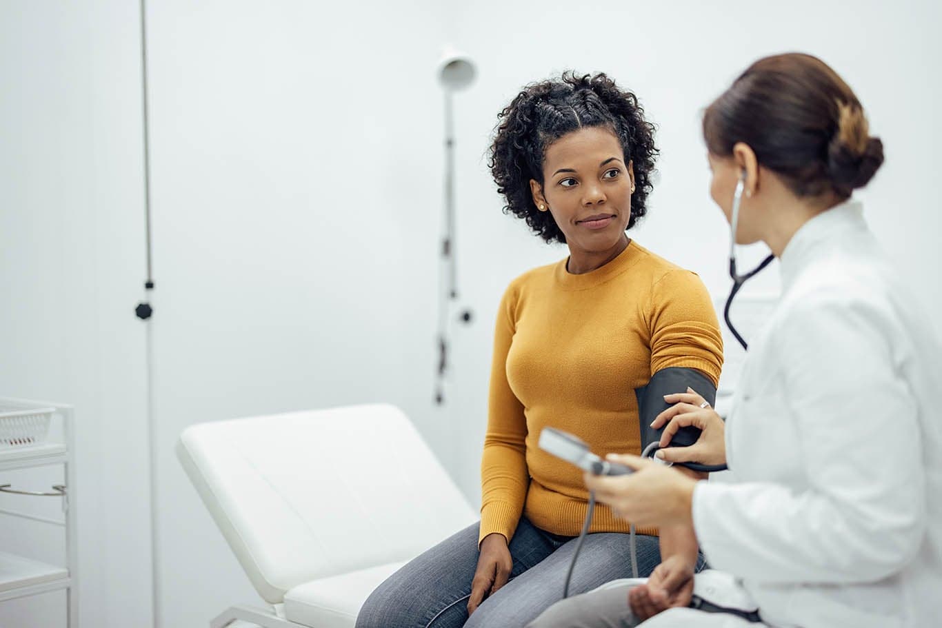 Woman consulting doctor